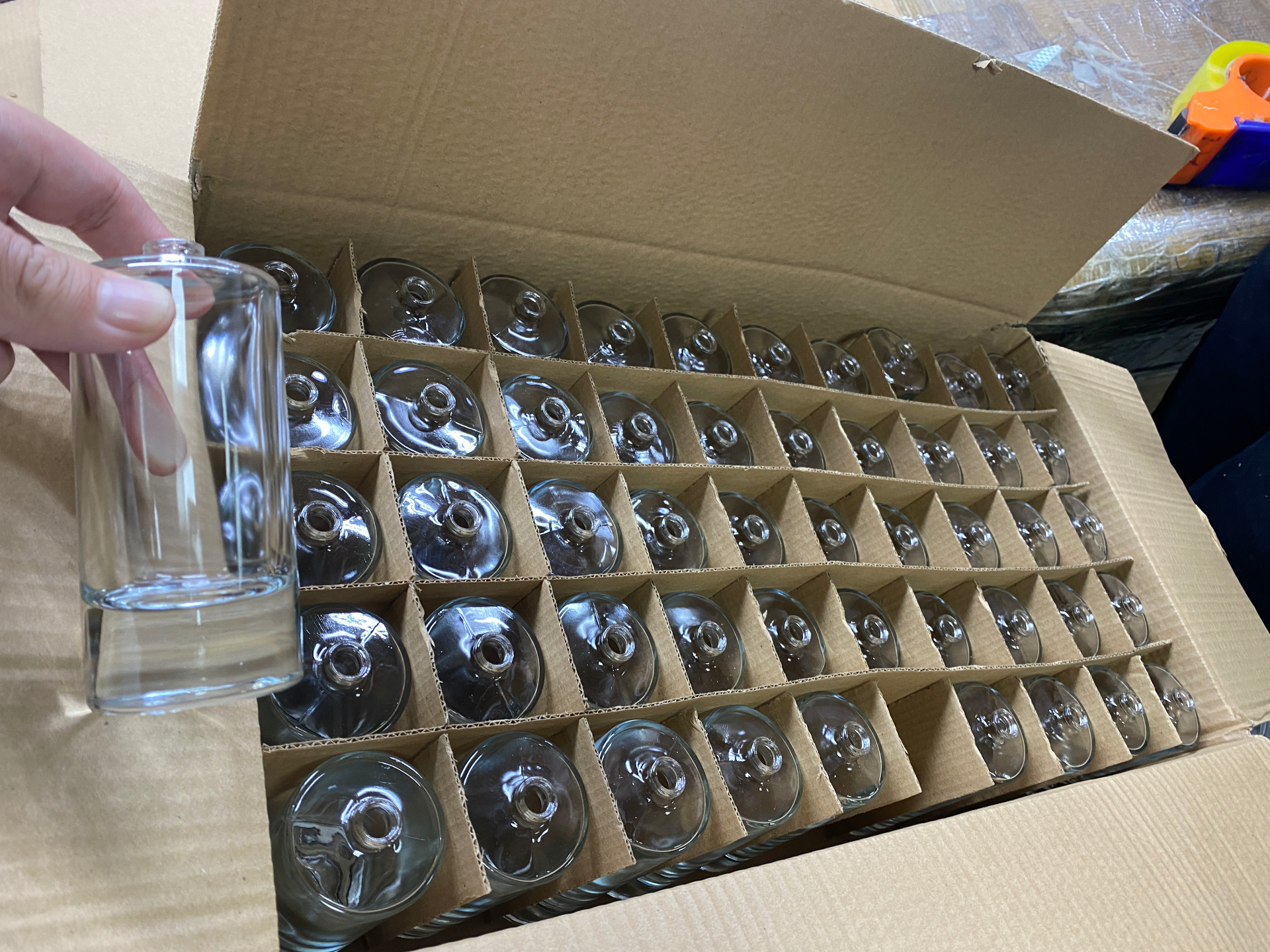 Perfume bottles wrapped and packed into export cartons